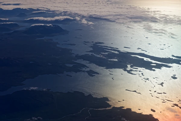 Photo : Islande (Iceland) vue du ciel par le hublot d'un avion à haute altitude.